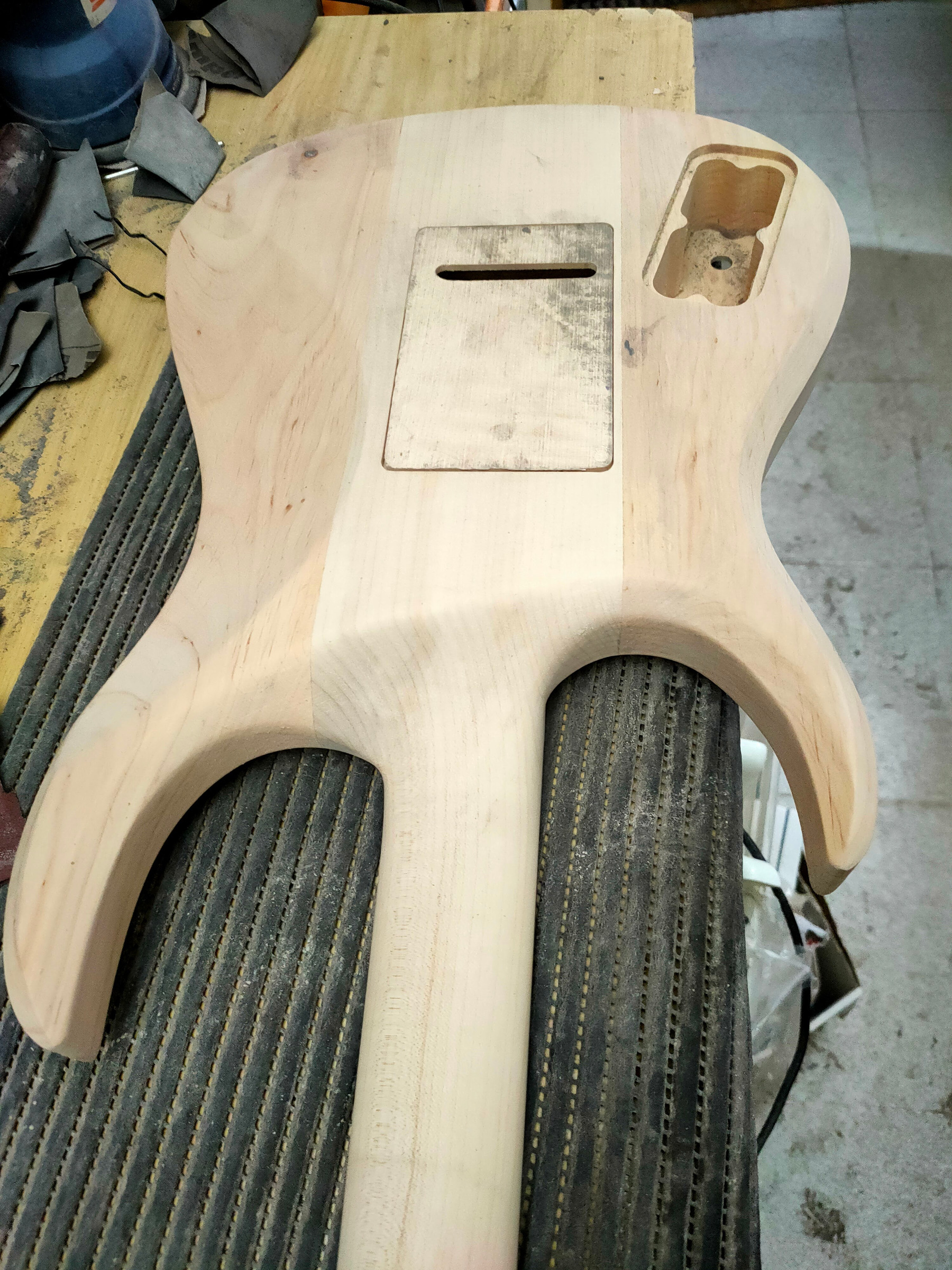 The back of a sanded raw body, on the bench grid