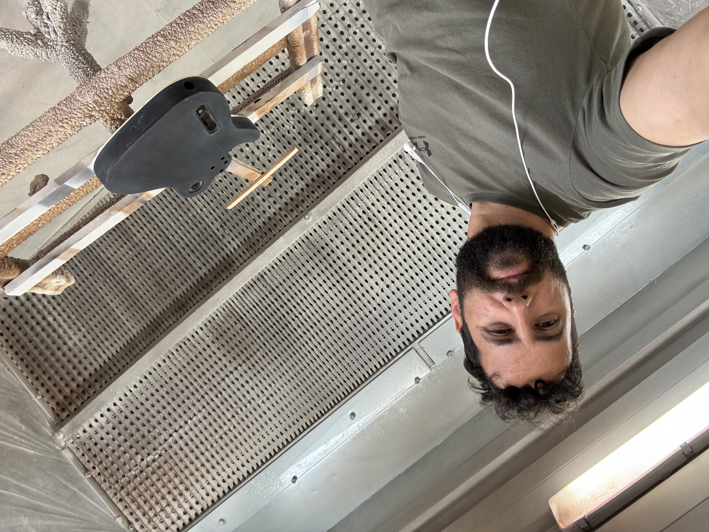 Alberto De Gattis in the workshop's spray booth